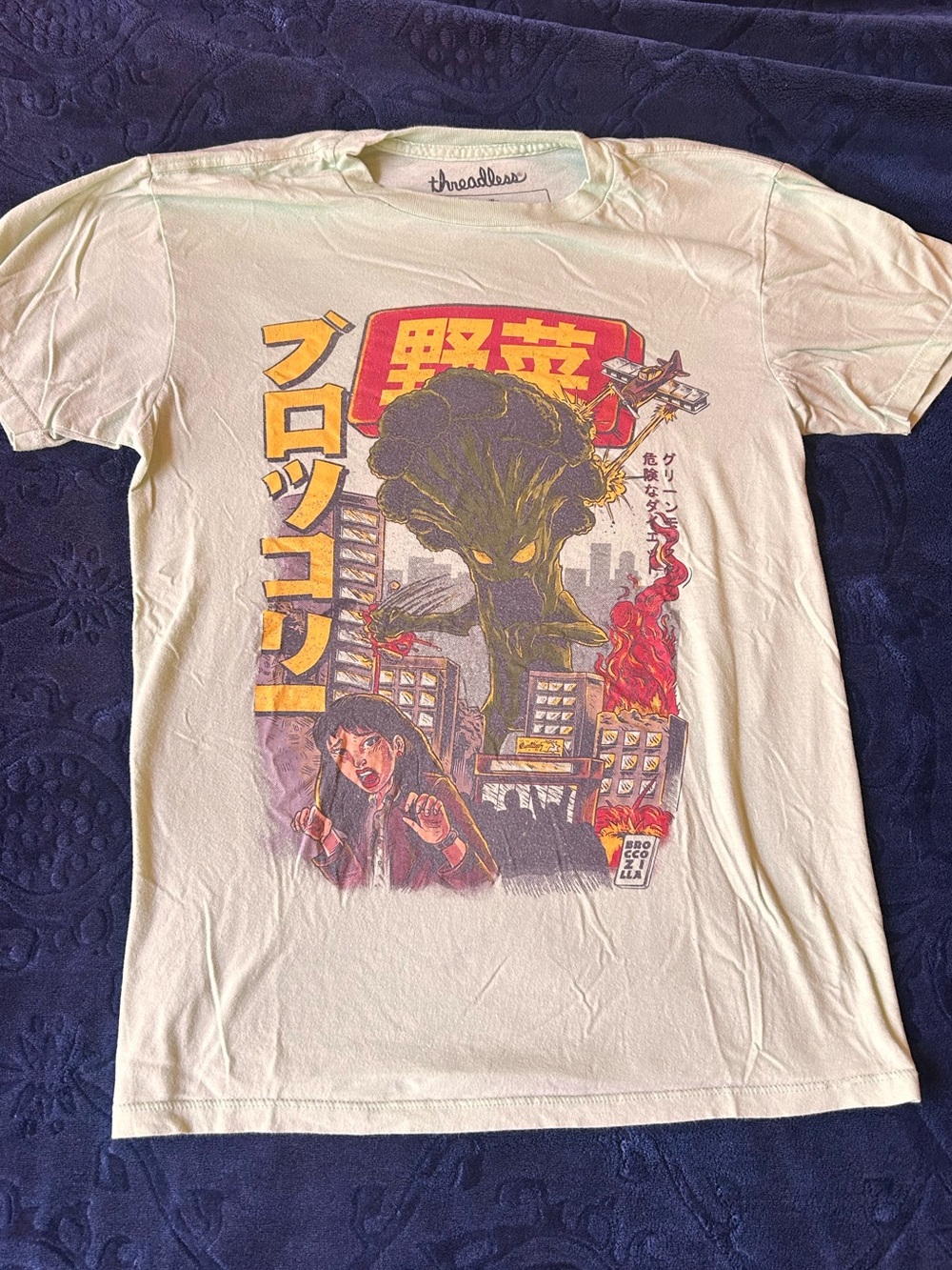 Threadless Pale Yellow Graphic Tee with Red & Purple Broccoli Monster